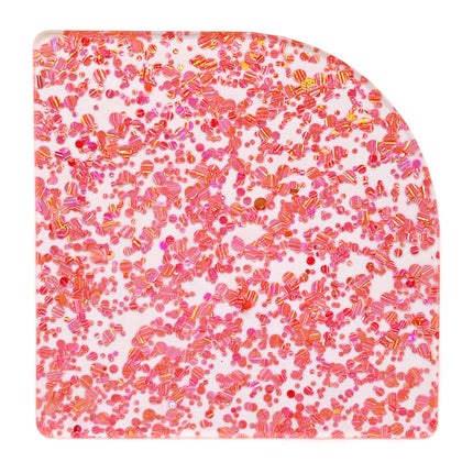 Materials for laser cutting, including pink glitter plexiglass and acrylic plastics.