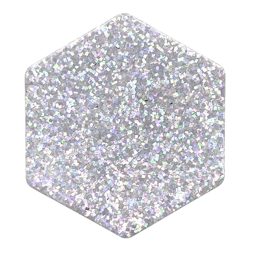 Patterned acrylic sheet with iridescent glitter, great for creative laser projects.