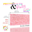 Hot pink acrylic sheet with iridescent holographic metallic finish, suitable laserable plastic for decorative purposes.