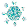 Glossy glitter plexiglass sheets cut into laser cut shapes with iridescent teal green glitter, ideal for vibrant DIY and laser art projects.