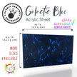 Opaque plexiglass sheet with a cosmic blue marble pattern, perfect for unique creations.